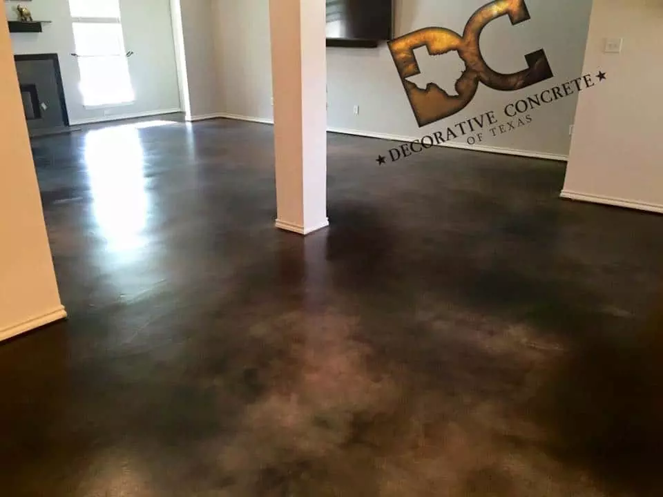 stained concrete flooring installation by Decorative Concrete of Texas