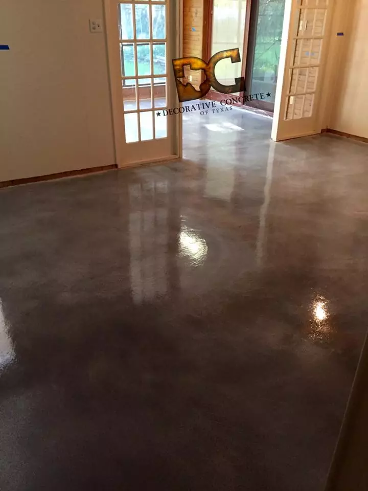 stained concrete flooring installation by Decorative Concrete of Texas