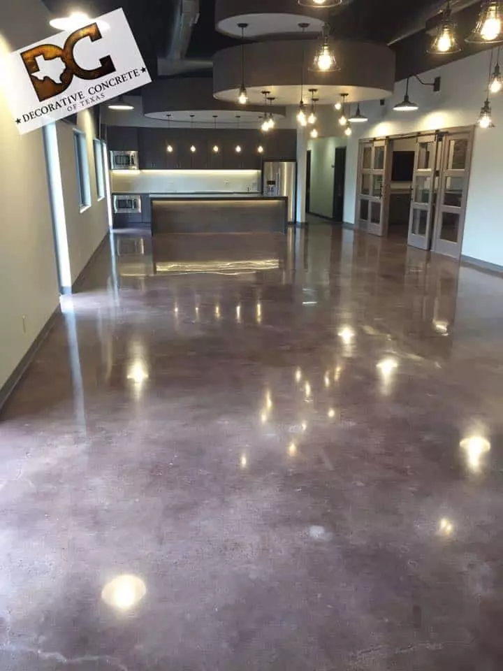 stained concrete flooring installation by Decorative Concrete of Texas