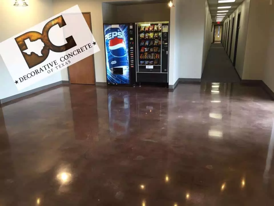 stained concrete flooring installation by Decorative Concrete of Texas