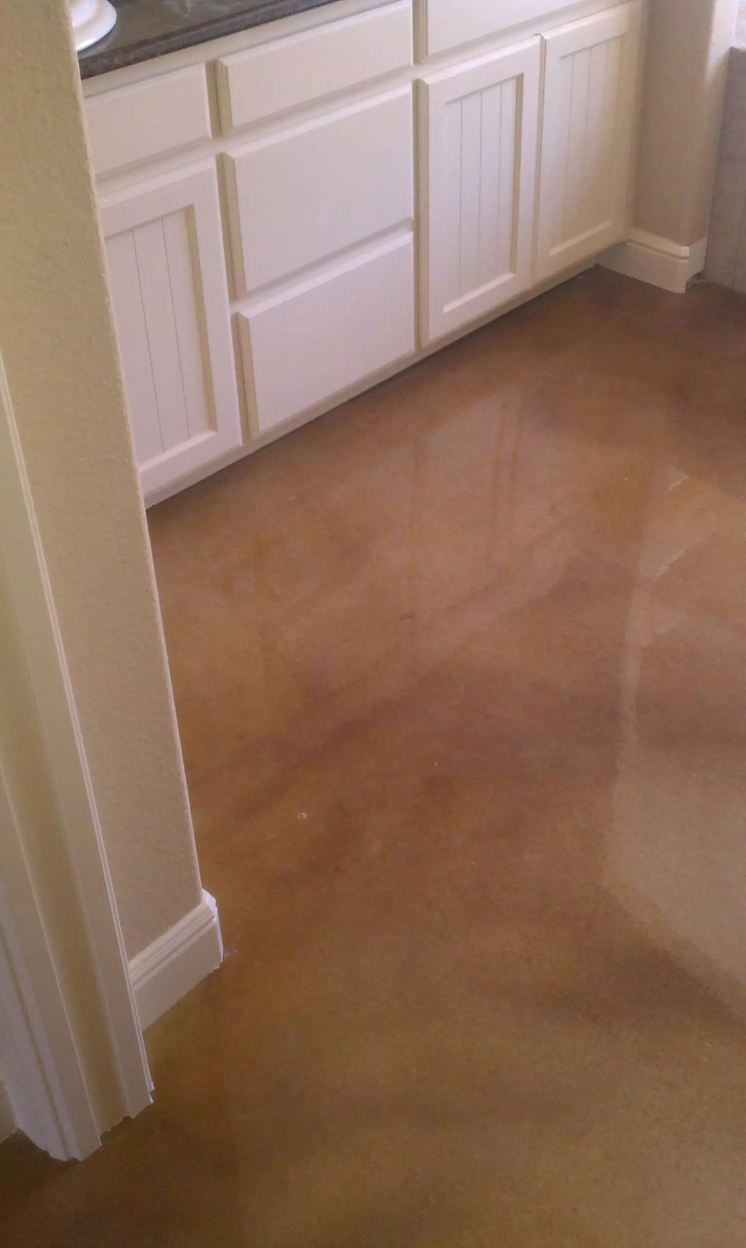 stained concrete flooring installation by Decorative Concrete of Texas