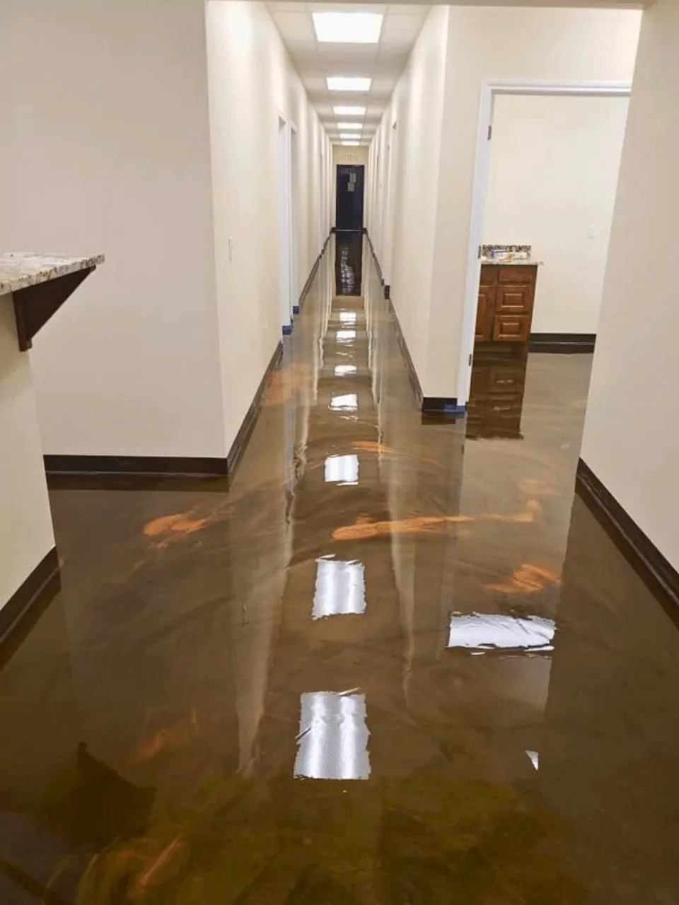 Brown, metallic epoxy, commercial floor coating, main hallway flooring, by Decorative Concrete of Texas - Commercial Floor Coatings Project