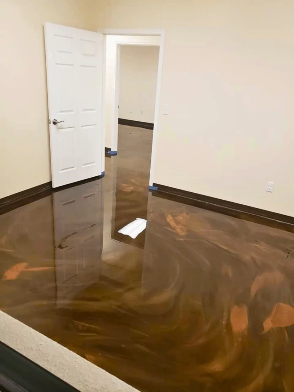 Brown, metallic epoxy, commercial floor coating, office flooring by Decorative Concrete of Texas - Commercial Floor Coatings Project