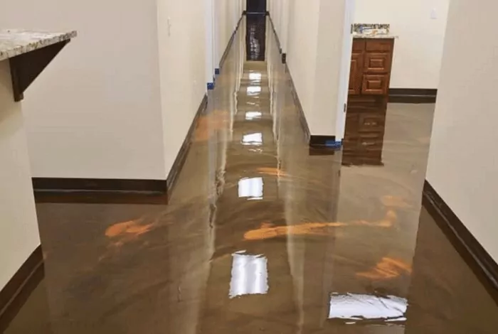 metallic epoxy commercial floor coating in Rockwall, TX by Decorative Concrete of Texas